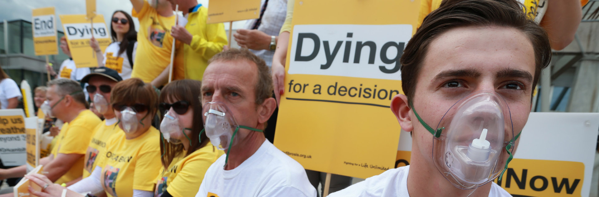 Banner showing a dark haired male with oxygen mask on with text that reads