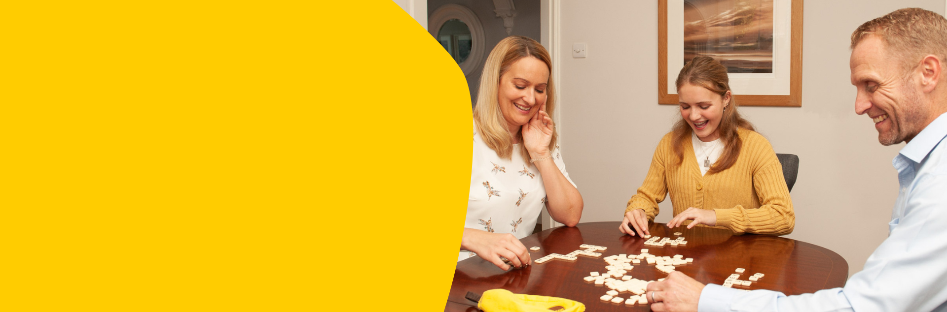 Tilly (who has CF) and her parents playing scrabble