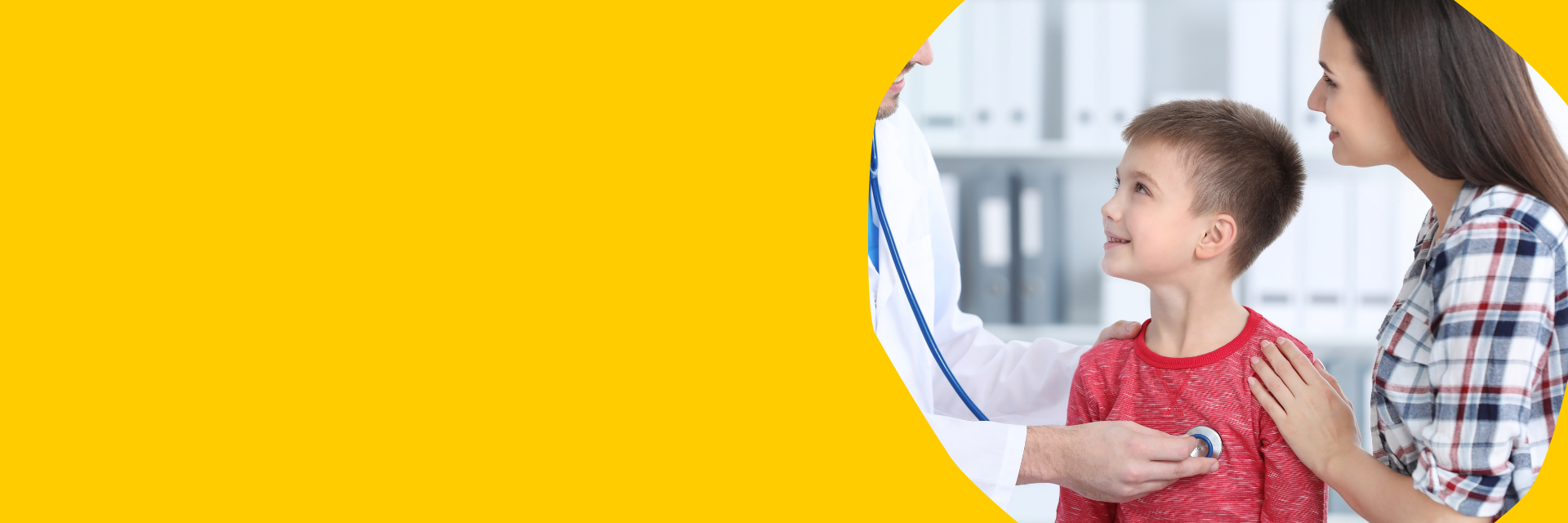 child with parent, doctor with stethoscope on child's chest