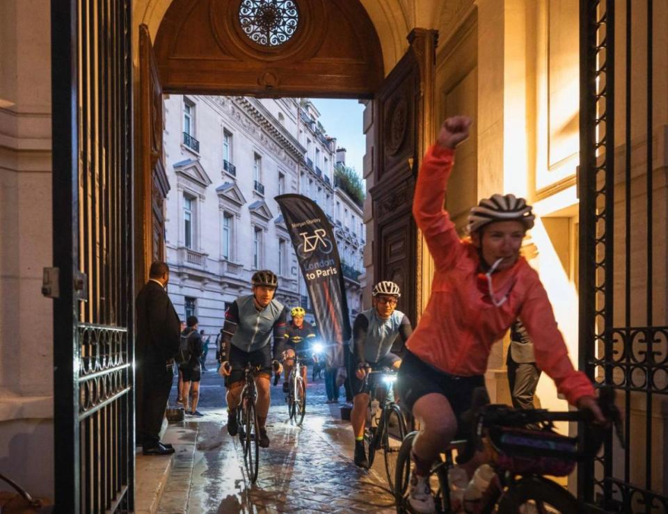 Andrew (left) cycling as part of the challenge