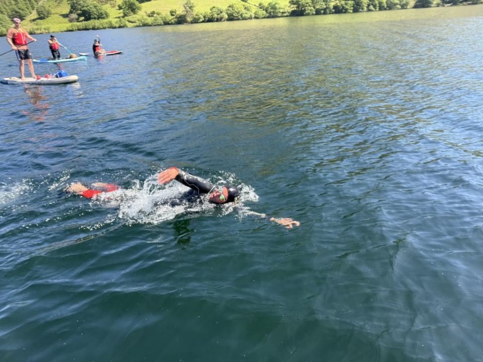 Adam swimming in the lake