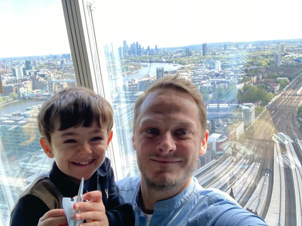 Carl and his son Nicholas stand at the top of the Shard