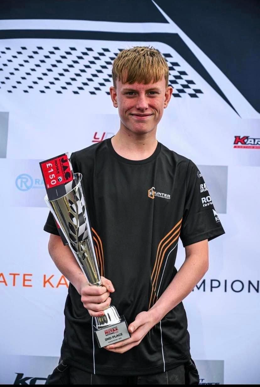 Jack holding his trophy