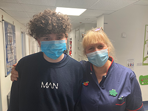 Isaac with nurse