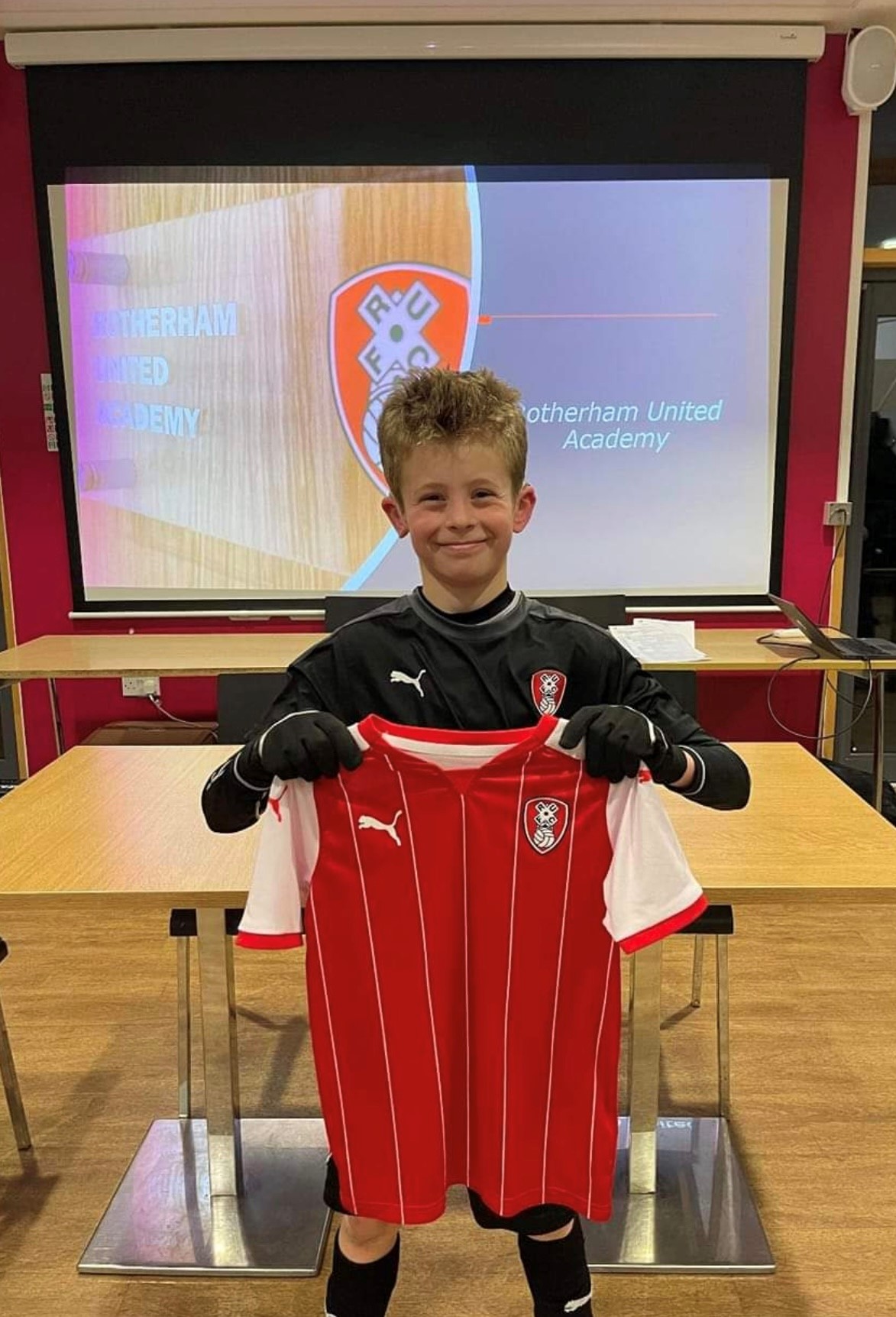 Leo with Rotherham shirt