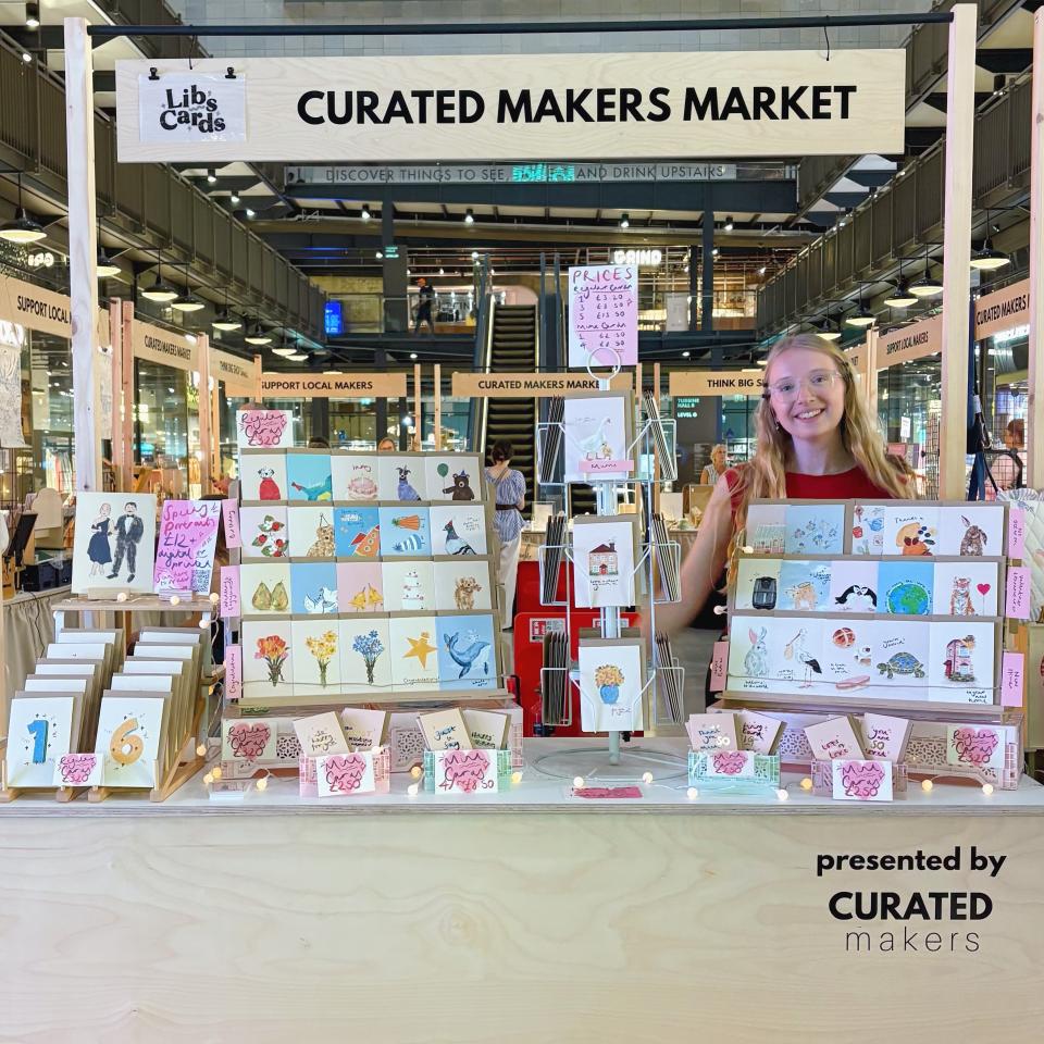 Libby at a market stall