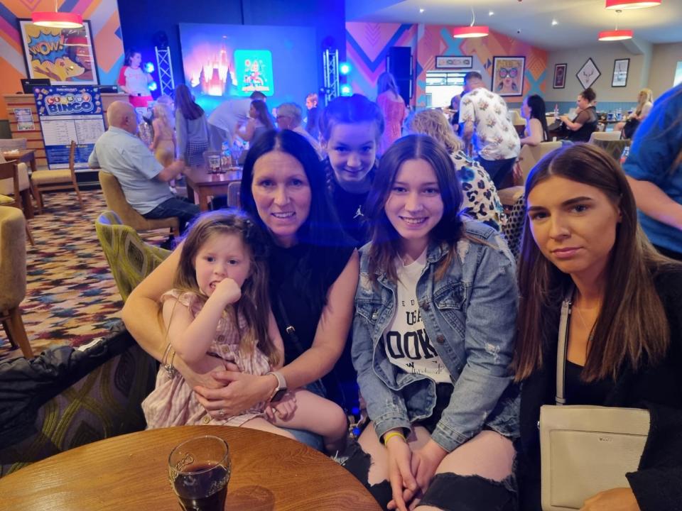 Mallie with her family