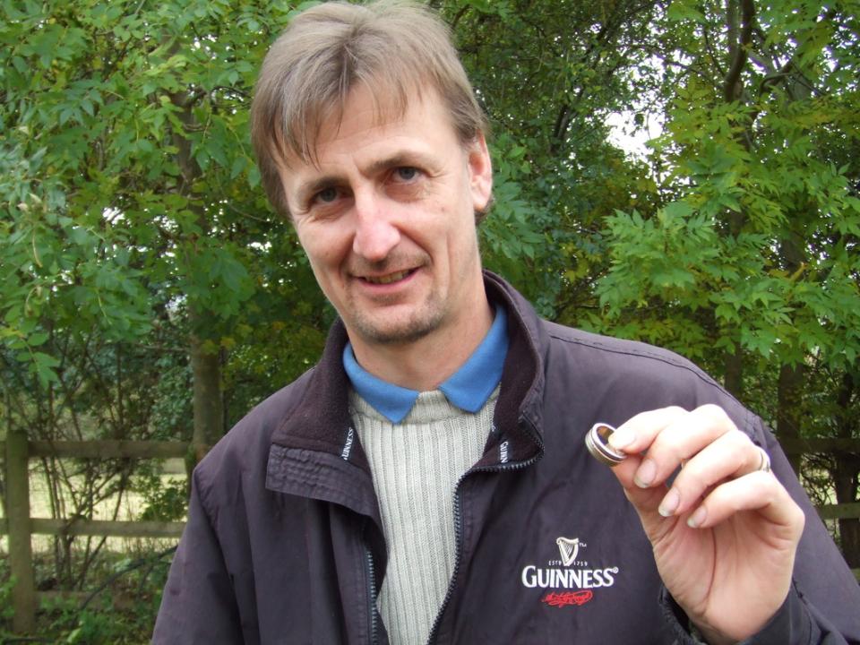 Morley holds up a ring he's found
