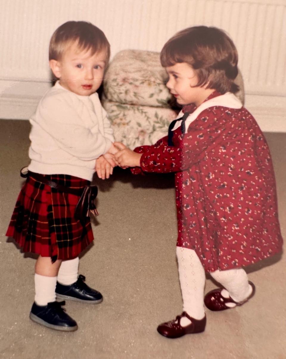 Nick and Philippa holding hands