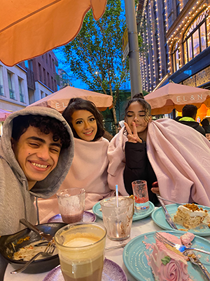 Photo of Kareem and his sisters