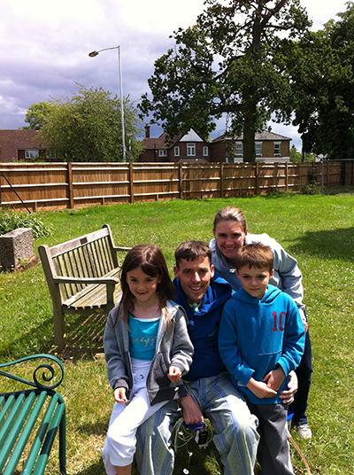 Sophie with her brother, mum and dad