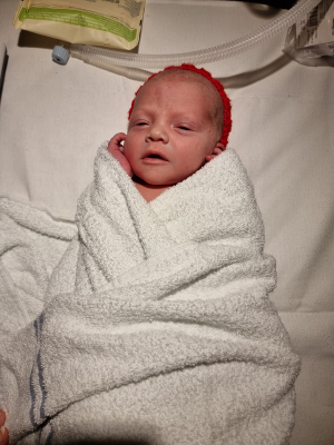 Ollie as a baby in the hospital