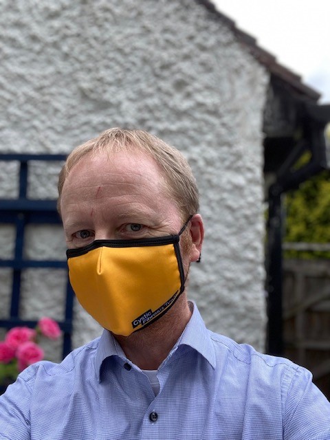 CF Chief Executive David Ramsden wears a CF branded mask