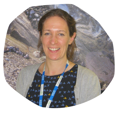 Dr Charlotte Boughton, a woman with brown hair wearing an NHS lanyard