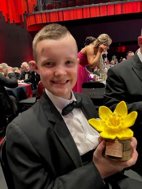 Rhys with his award