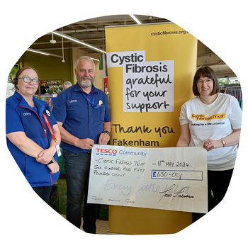 Sharon, receiving a donation for the Trust