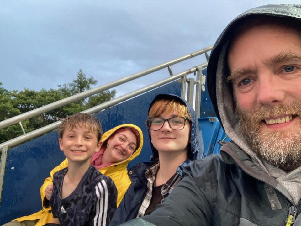 Tim with his wife and sons
