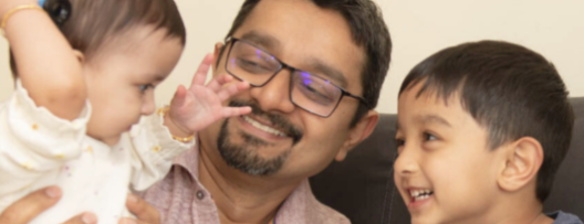 Happy father with two children