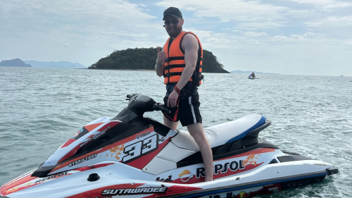 Photo of Ashley on a jetski