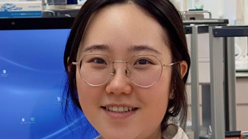 photo of researcher in a lab coat