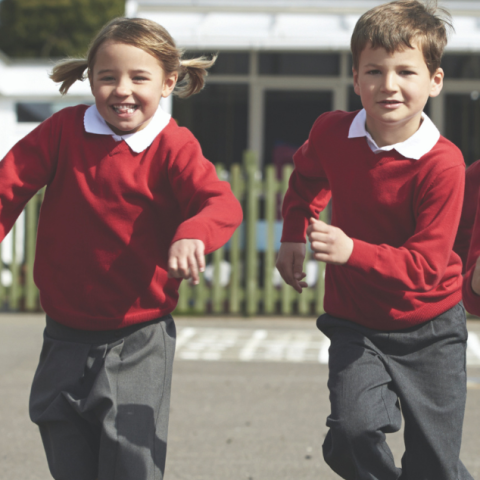 kids running in school uniform