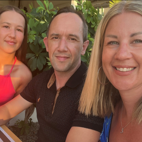 Bob, who has CF, sitting with his wife Claire and their daughter