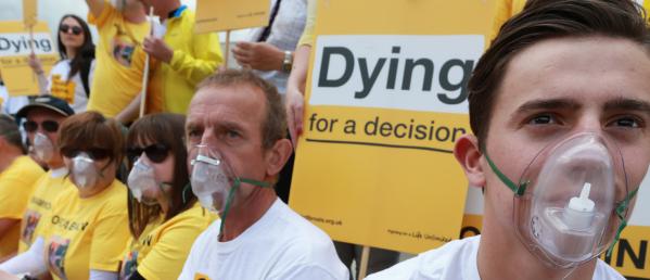 Banner showing a dark haired male with oxygen mask on with text that reads