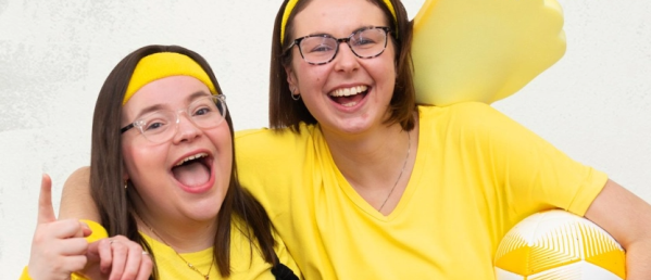 Happy people dressed in yellow