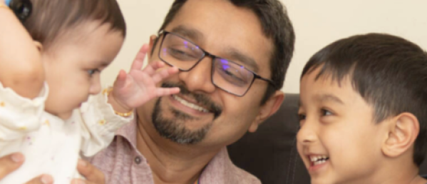 Happy father with two children