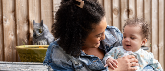 Shanique holding baby Thiago