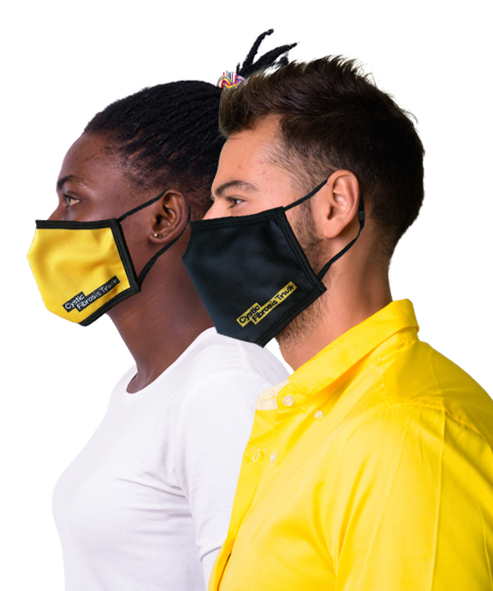 Side profile of a black woman and white man wearing cystic fibrosis trust facemasks