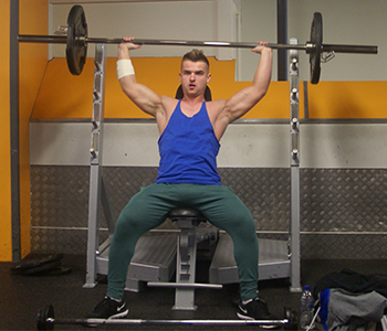 Joe lifting weights