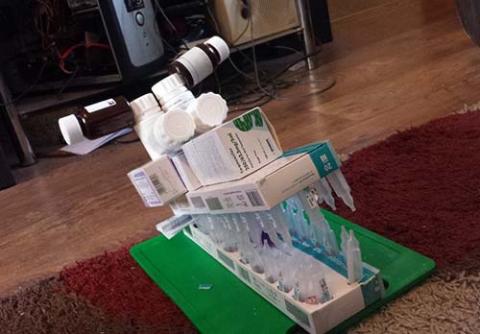 An image of a dragon head made out of CF medication