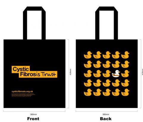 An image of both sides of a black tote bag. One side has the Cystic Fibrosis Trust's logo on it, while the other has four rows of yellow ducks on it.