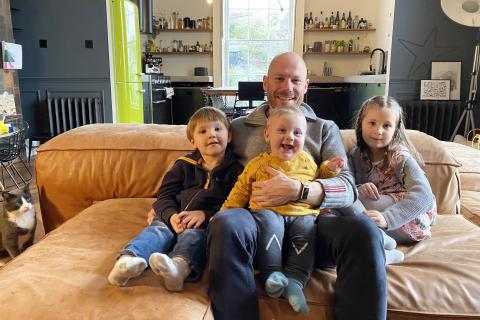 Photograph of Rob Law with his children Rafe, Kip and Ida