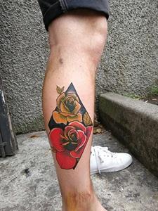 Callum's tattoo of two roses on his leg