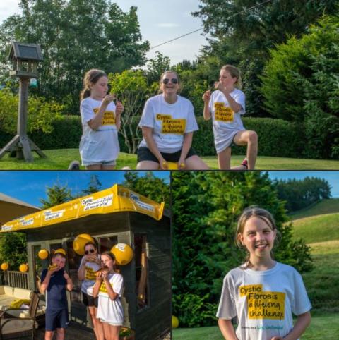 Family of three wearing Cystic Fibrosis Trust t-shirts in garden with bubbles at a BBQ