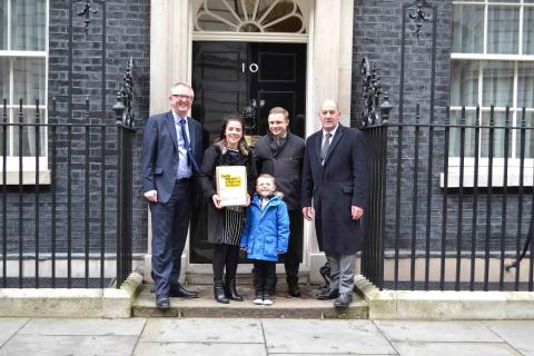 Carly Jeavons with the petition, from left to right with father Bob, son Corey, Darren O'Keefe Public Affairs Manager and Ian Austin MP