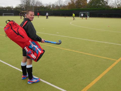 Tim playing hockey