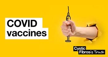Hand holding a syringe. Text reads COVID vaccines