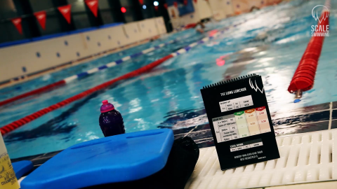 Jonathan Scale Swimming Helen Barrett Bright Idea Award winner - swimming pool and kickboard and notebook