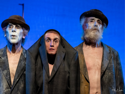 Jack on stage in between two other actors