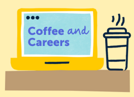 computer screen with coffee cup next to it