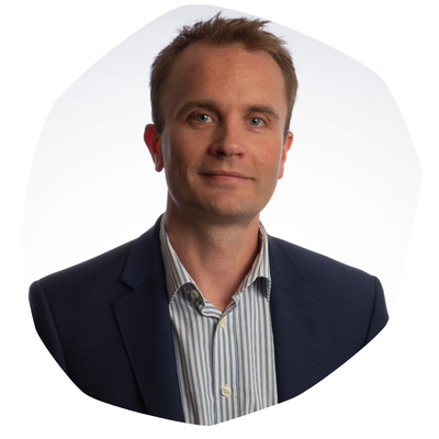 Professor Nick Simmonds, a man wearing a dark suit and striped shirt